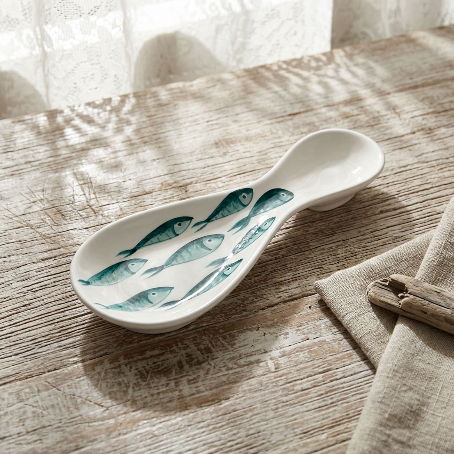Poggiamestolo in ceramica decorata pesci