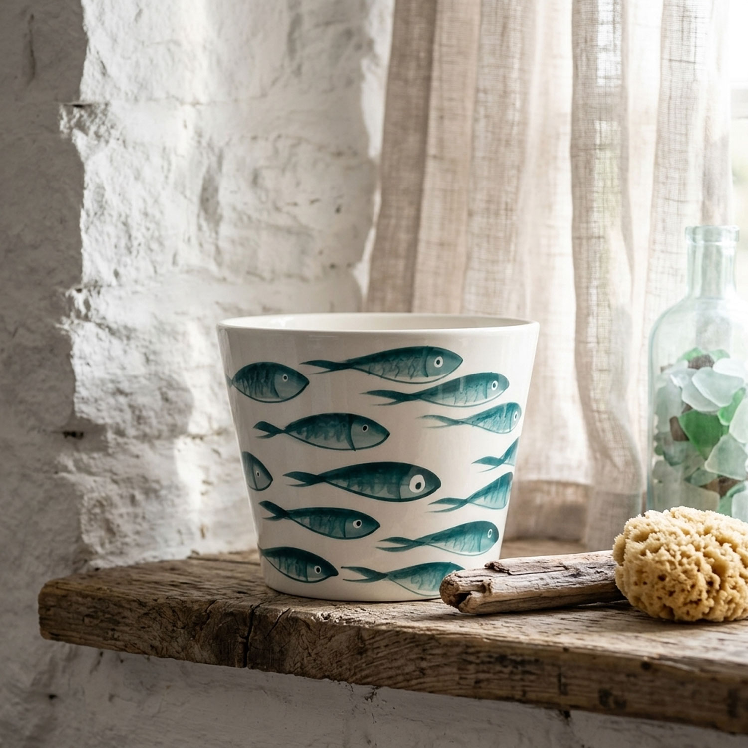 Vaso in ceramica decorata pesci