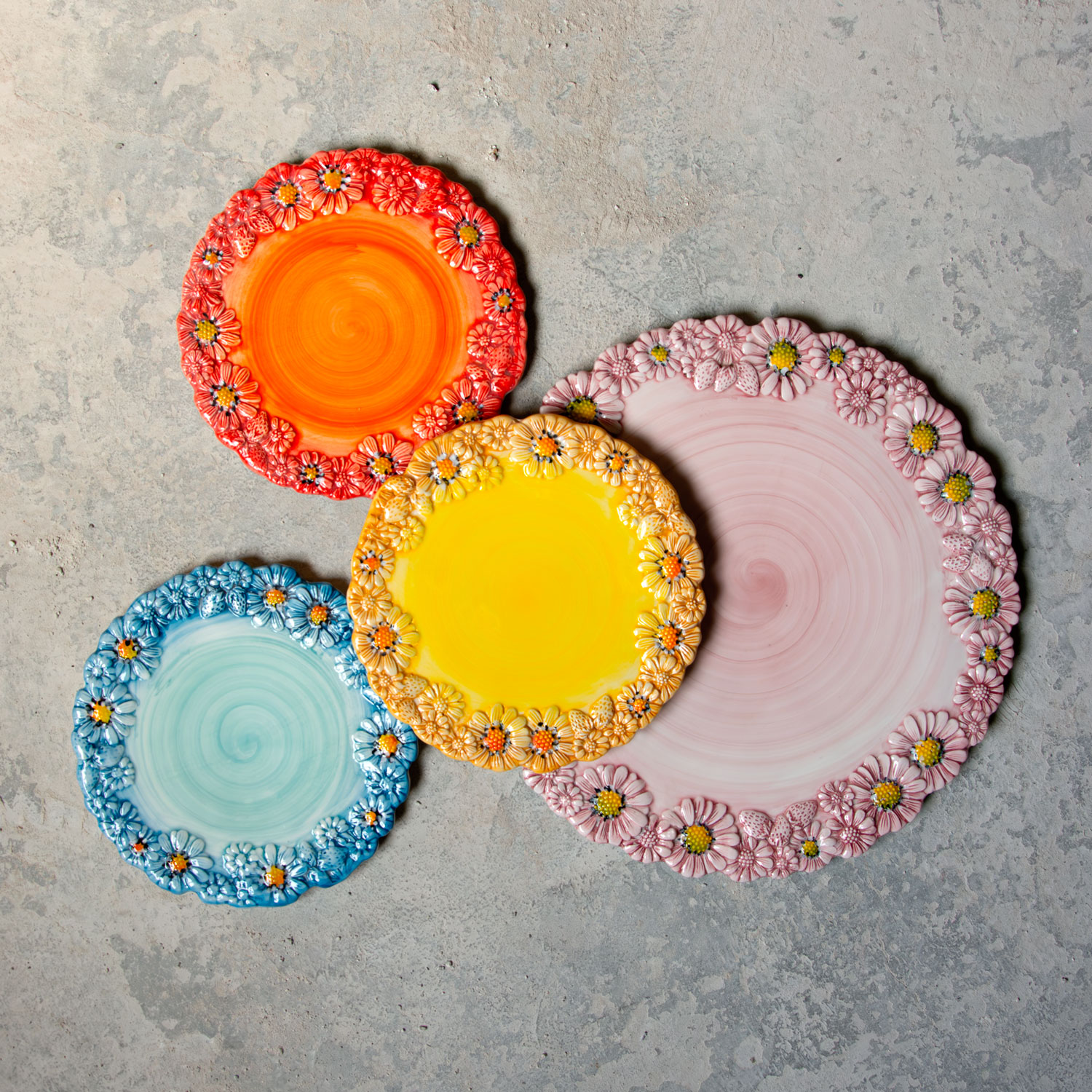 Red dessert plate with daisies
